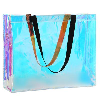 China Handled 2023 Hot Sale PVC Ladies Handbag Transparent Waterproof Holographic Beach Bag Color Lightweight PVC Shopping Bags With Handle for sale