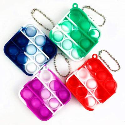 China Amazon Mini Silicone Push Pop Bubble Stress Reliever Sensory Toys Autism Stress Reliever and Worry Squeeze Toy with Link Dye Key Chain for sale