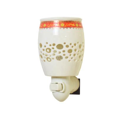 China Cast Iron Ceramic Wax Burner Indoor Hotel Yoga Gym Aromatherapy Wall Plug In Lamp Oil Burner for sale