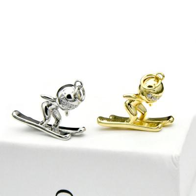 China Cute Ski Boy Pendant New Fashion Decoration Cute Pocket Gold Plated Silver Surf Unisex Pendant Jewelry for sale