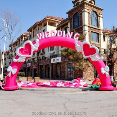 China Colorful PVC Coated Nylon Pink Wedding Inflatable Heart Arch for sale