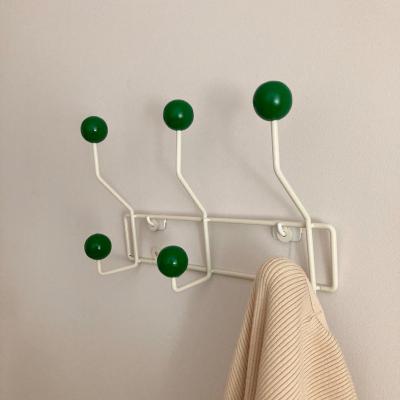 China Korean Vintage Clothes Hat Wall Iron Frame Hooks With 6/8 Green Cream Wooden Balls For Hanging for sale