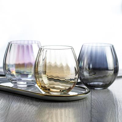 China Best Selling Egg Shape Dishwasher Safe Glass Tumbler Water Glass Luxury Colorful Handmade Stemless Wine Glass for sale