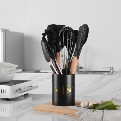 China Sustainable 10 Pieces In 1 Set Kitchen Gadgets Tools Rack Kitchenware Spatula Silicone Cookware Set With Wooden Handles for sale