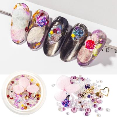 China Flatback Assembled Mixed Nails Flower Dry Alloy Rhinestone Nail Art Decoration for sale