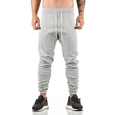 China Breathable Customizable LOGO FASHION Drawstring Knitted Casual Mens Sweatpants for sale