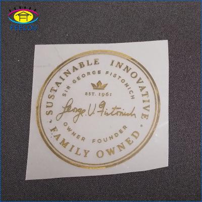 China Garment Gold Color Rubber Iron On Heat Transfer Logo Patch For Shirt for sale