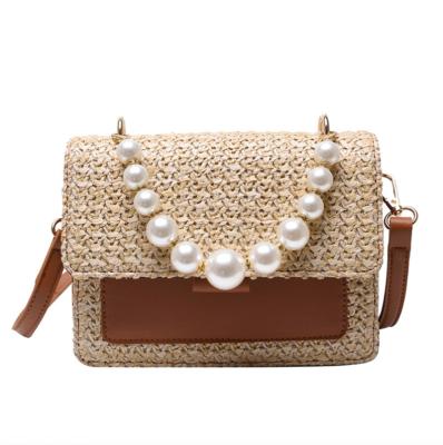 China PU Straw Women's Bag Small Square All-match Beach Holiday One-shoulder Messenger Bag Pearl Handbag for sale