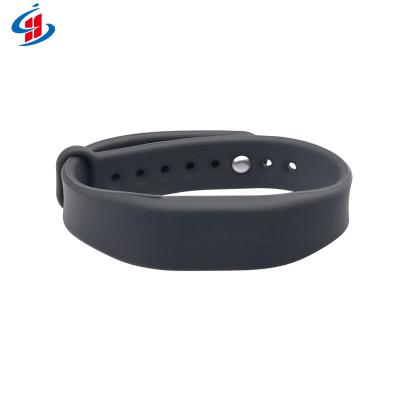 China Custom Reusable Adjustable Waterproof/Waterproof RFID Silicone Wristband 13.56Mhz For Gym Fitness Center for sale