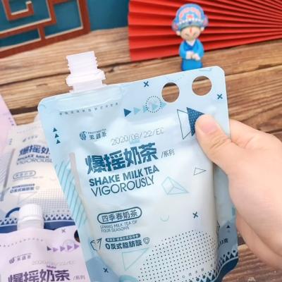 China Full Size Custom Printed Stand Up Plastic Hand Shake Milk Tea Spout Pouch Shake Milk Tea With Spout for sale