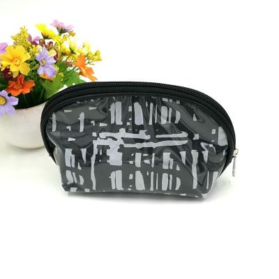 China Cheapest Fashion Shell Make Up Cosmetic Bag OEM Printing Tyvek Paper Cosmetic Bag for sale