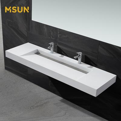 China Long Sink Hotel Washroom Basin Modern Solid Outdoor Vanity Basin Wall Mounted Bathroom Basin for sale