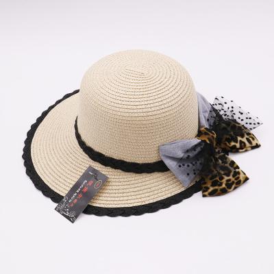 China Character fashion beach hat petal brim lace bow wide brimmed summer sun paper straw beach hat for sale