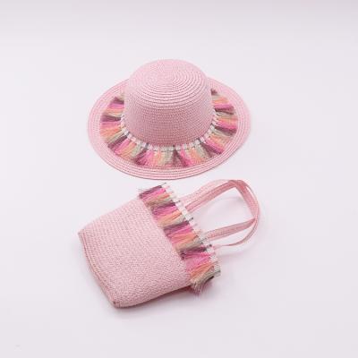 China 2021 new character hat girl pink bucket straw hat handbag set small bag parent set cute child straw hat fresh for sale