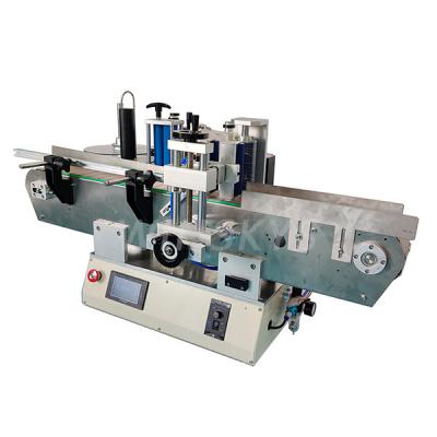 China Low price products automatic water cup glass bottle printing sticker labeler table positioning adhesive machine for sale