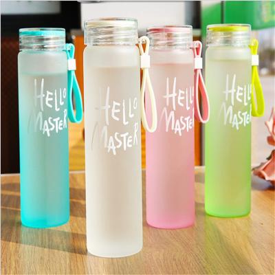 China Wholesale Sustainable Gym Outdoor Colorful Frosted Sustainable Glass Water Bottle With Lid for sale