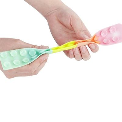 China 2022 Jumping Person Toy Squido Pop Antistress Relief Sucker New Amazon Suction Squidopop Busy Person Toy Pull Snap Silicone Game Toy Popper Squidopop for sale