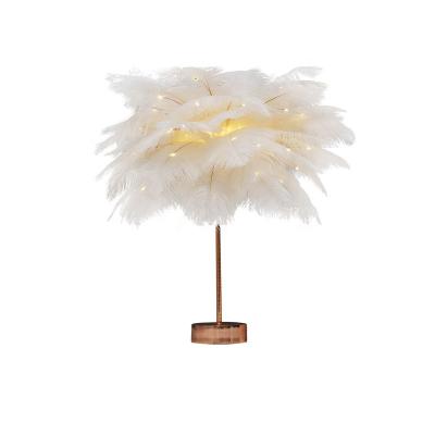 China Luxury Home Decoration Creative Romantic Tree Feather Table Light With Warm Lighting for sale