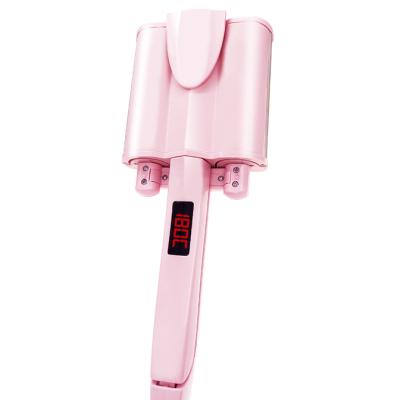 China New Professional Electric Three Curling Iron Tube Revolving Egg Curling Rod Ceramic Dry And Wet Electric Hair Curler Household Splint Curving Rod for sale