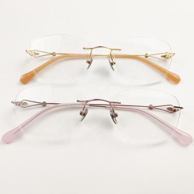 China Fashion 23905 ready to ship cheap optical frames women rimless glasses for sale