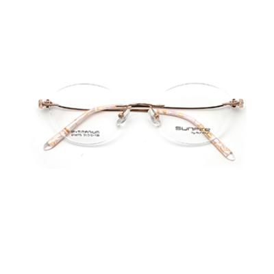 China ST8775 Fashion Women High Quality Rimless Glass Pure Titanium Optical Frames for sale