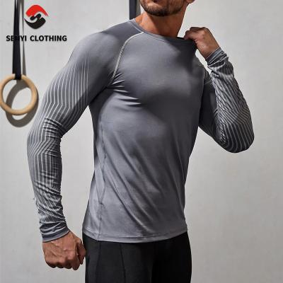 China Others Mens Sporting Custom Long Sleeve Mens Racing Shirt Black Compression Tank Tops Fitness for sale