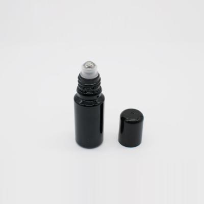 China Personal Care 10ml Black Glass Ball Bottle Stainless Steel Ball Oil Perfume Ball Bottle Vial Container for sale