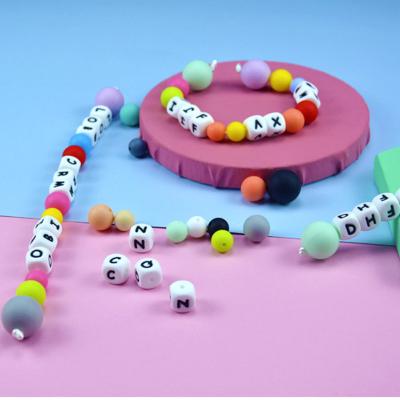 China Can Be Food Grade Exercise Baby Boiled Color Cognitive Ability Teething Newborn Molar Relief Teether Glue Silicone Bead Toy for sale