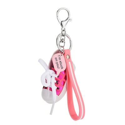 China Accessories Such As Key Chain Small Daisy Pvc Sneaker Keychain Of New Creative Cute Shoe Canvas Mobile Phone Shell Pendants for sale