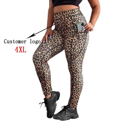 China Breathable Gym Fitness Tights Woman Plus Size Leopard Print Yoga Leggings With Pockets Gaiters for sale