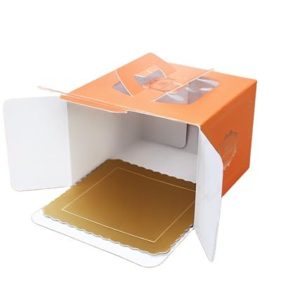 China Custom PVC Insert Logo Matt Lamination Orange Cake Truffle Take Out Box Bakery Cake Box Luxury Custom for sale