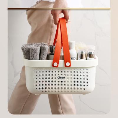 China Creative New Design 2021 Sustainable Viable Storage Basket For Plastic Portable Bathroom Houseware Cosmetics Wash Supplies Storage Basket for sale