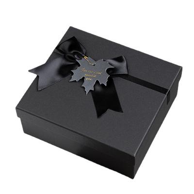 China Recyclable Black Cardboard Slotted Bow Gift Boxes Gift Packing Box Hard Box for sale