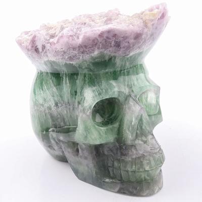 China Wholesale High Quality Natural Carved Amethyst Europe Fluorite Crystal Skulls Ornaments Gemstone Skulls for sale