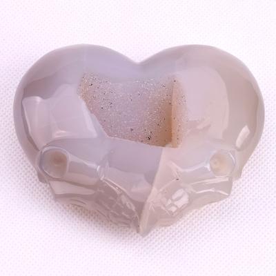 China China Exquisite Hand Carved Crystal Craft Semi Precious Statue Heart Shape Skulls Face for sale