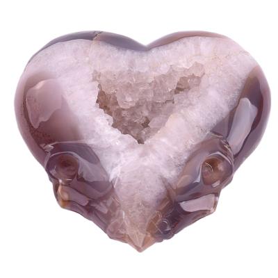 China China Exquisite Hand Carved Crystal Craft Semi Precious Geode Statue Heart Shape Two Skulls Face for sale