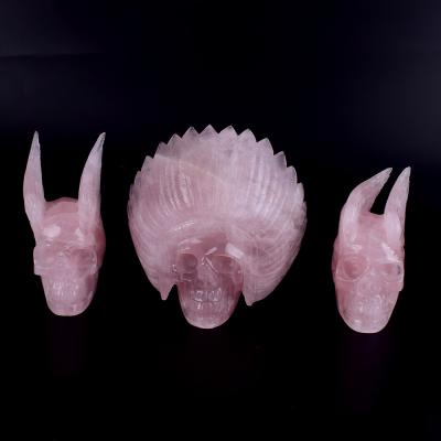 China Europe natural rose quartz crystal hand carving alien and wing skull for sale for sale