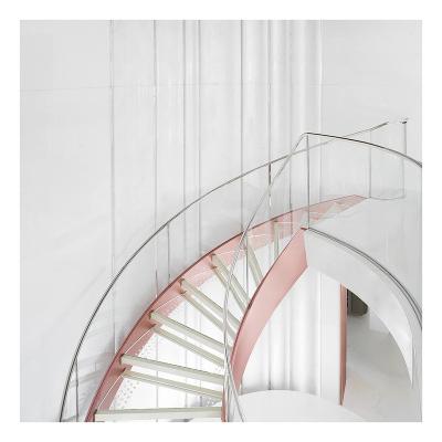 China Contemporary Architectural Supplies Can Be Customized Design Luxury Interior U Shaped Tempered Glass Curved Staircase for sale