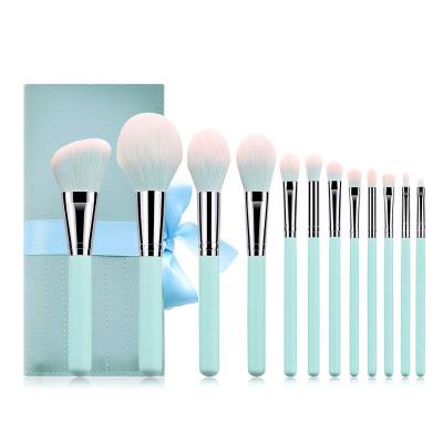 China Angular Blush Makeup Brush Set 12 Hair Eyeshadow Highlighter Bar Blush Loose Powder Brush Beauty Tool for sale