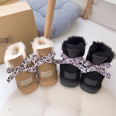 China Classic Round Mini Boot Ankle For Ladies Snow Down Collar Women Sheep Fur Shoes Girls Women's Waterproof Lady Winter Snow Boots for sale