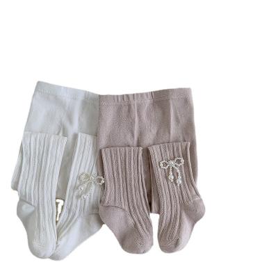 China Hot Selling Kids Stockings Baby Tights Cotton Pearl Arc-knot Breathable Knitted Colorful Baby Tights QUICK DRY for sale