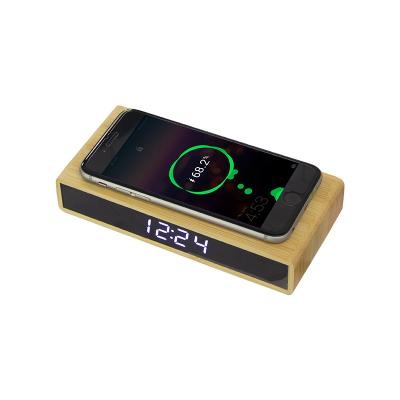 China Mobile Phone Digital Display Clock Charger Wireless Bamboo Material Bamboo Charging Clock for sale