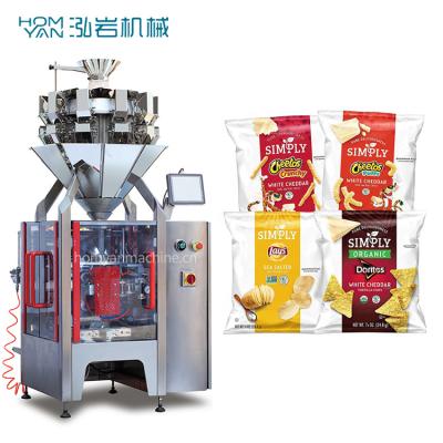 China 100g~1lb food potato chips candy snack pouch automatic multihead weighting and filling packing machine for sale