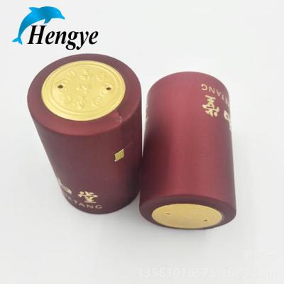 China pvc heat shrink cap seal for wine bottle, pvc shrink capsules PVC wine caps for red wine bottle in red color for sale