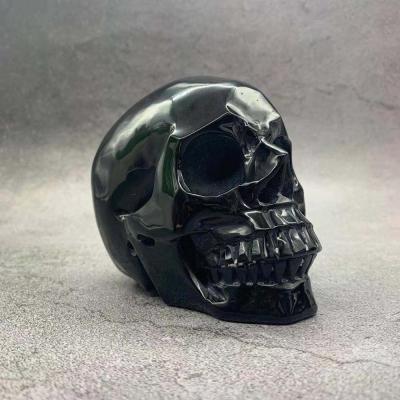 China Wholesale Europe Obsidian Natural Crystal Skulls Crystal Carving Black Carved Crystal Crafts For Decoration for sale