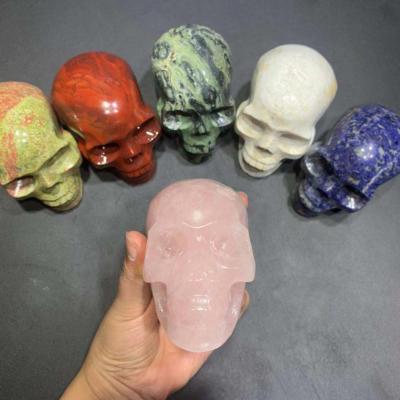 China Wholesale Natural Europe Rose Quartz Crystal Skulls Carved Crystal Cutting Crafts For Decoration for sale