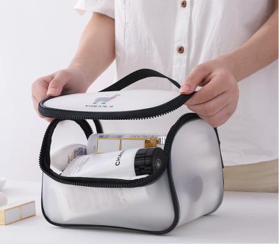 China Fashion Waterproof Transport TPU Eco Friendly Travel Cosmetic Bag With Zipper for sale