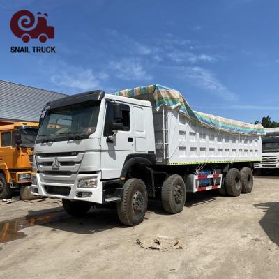 China Original China Sinotruk Howo 8X4 Dump Truck Heavy Duty Truck Tipper With Cheap Price > 8L for sale