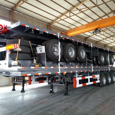 China Truck Trailer Brand 40ft Container Trailer 12 Head Twist Locks Flat Bed Semi Trailer For Transport Containers for sale