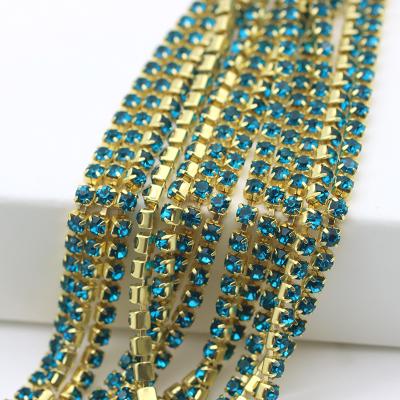 China Flatback One Row Rhinestone Cup Chain Gold Colored Base Sew On Rhinestone Mesh For DIY Fabric Elegant Shoes Decoration for sale